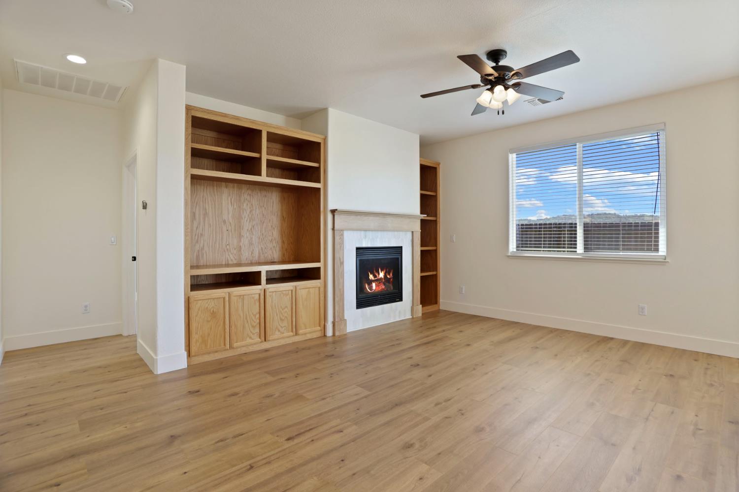 312 Copper Crest Drive Copperopolis, CA 95228 - Photo 36 of 38 a view of an empty room with a window and wooden floor
