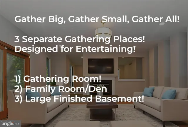 a dining room with furniture potted plants and wooden floor