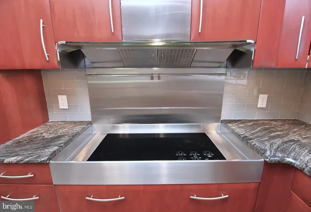 a view of a roof deck with couches