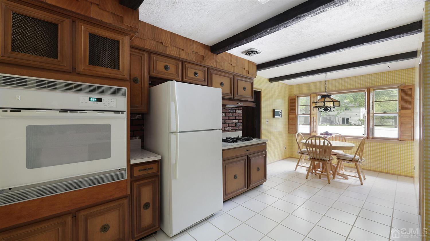 20 Lynnwood Road Edison, NJ 08820 - Photo 11 of 30 a kitchen with cabinets and stainless steel appliances