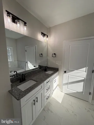 a bathroom with a sink and a toilet
