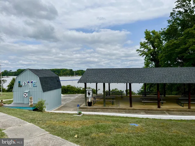 a view of a lake with a yard