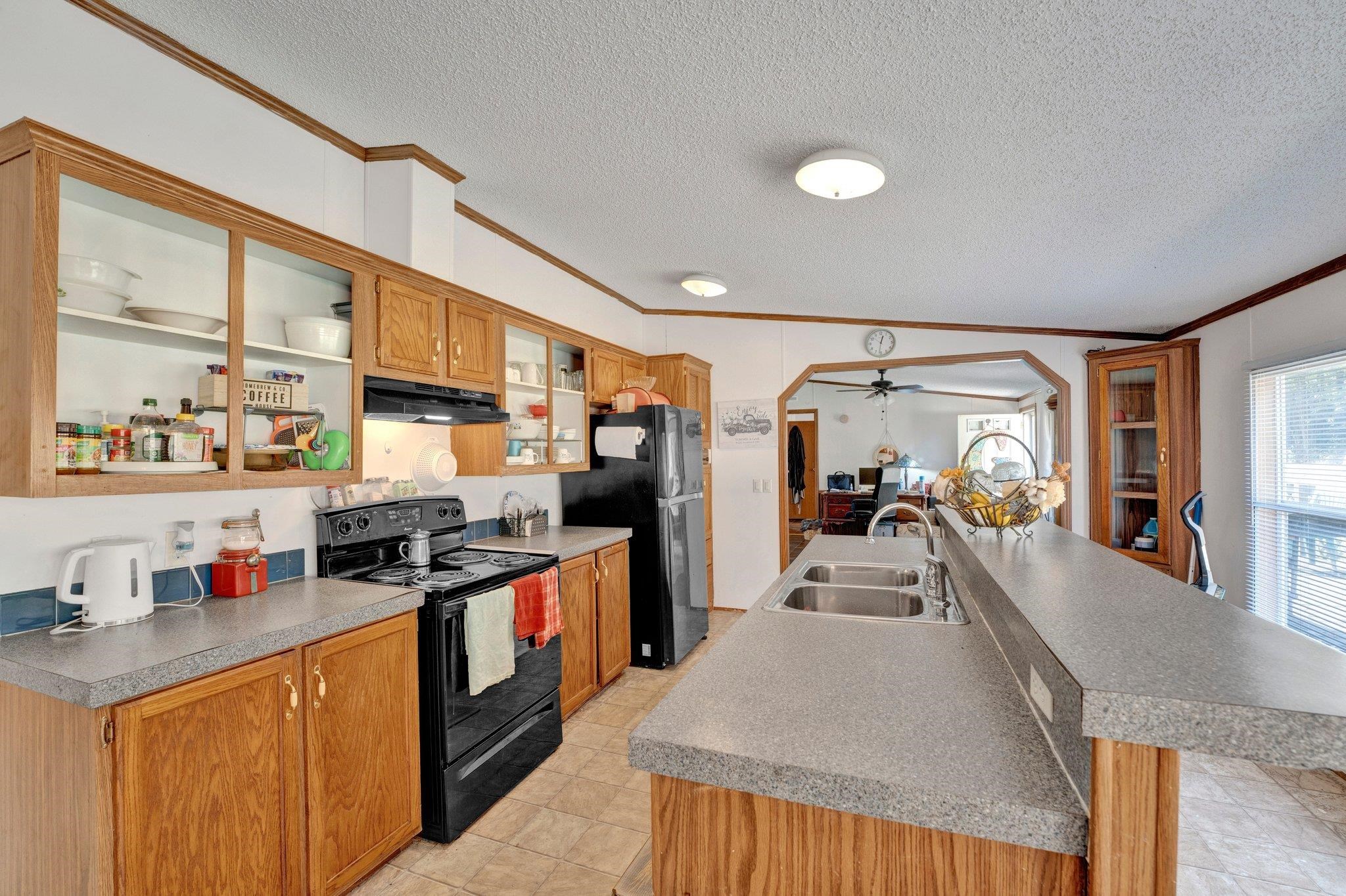 6170 Rust Road Millington, TN 38053 - Photo 13 of 34 a kitchen with stainless steel appliances granite countertop lots of counter top space