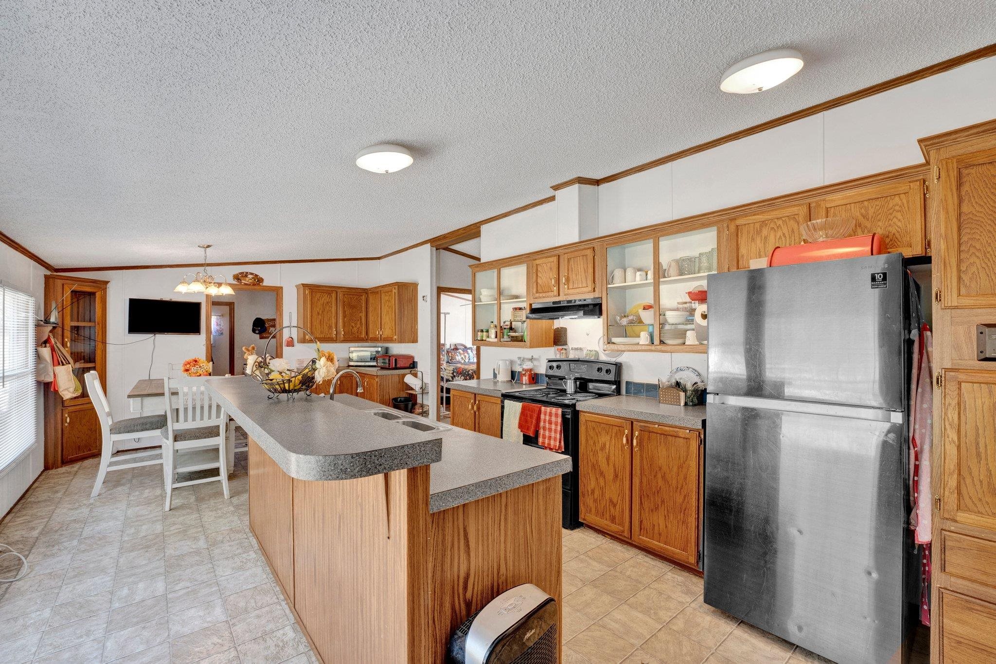 6170 Rust Road Millington, TN 38053 - Photo 14 of 34 a kitchen with counter top space and stainless steel appliances