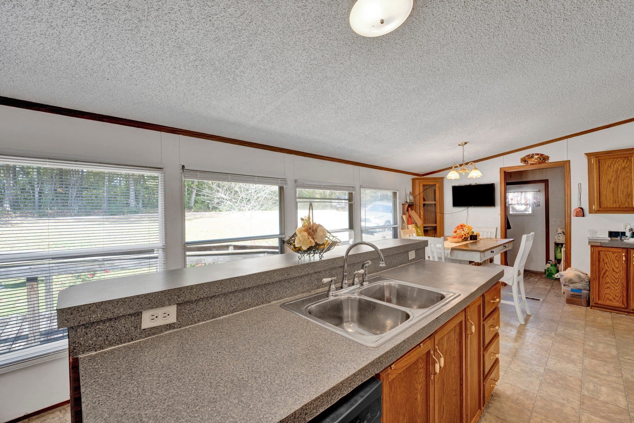6170 Rust Road Millington, TN 38053 - Photo 17 of 34 a kitchen that has a sink and a stove
