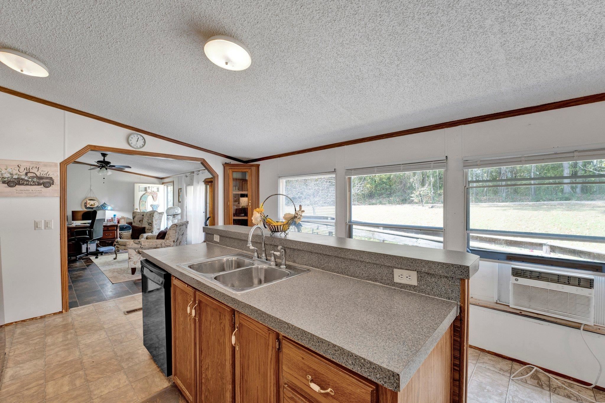 6170 Rust Road Millington, TN 38053 - Photo 19 of 34 a kitchen with sink stove and cabinets