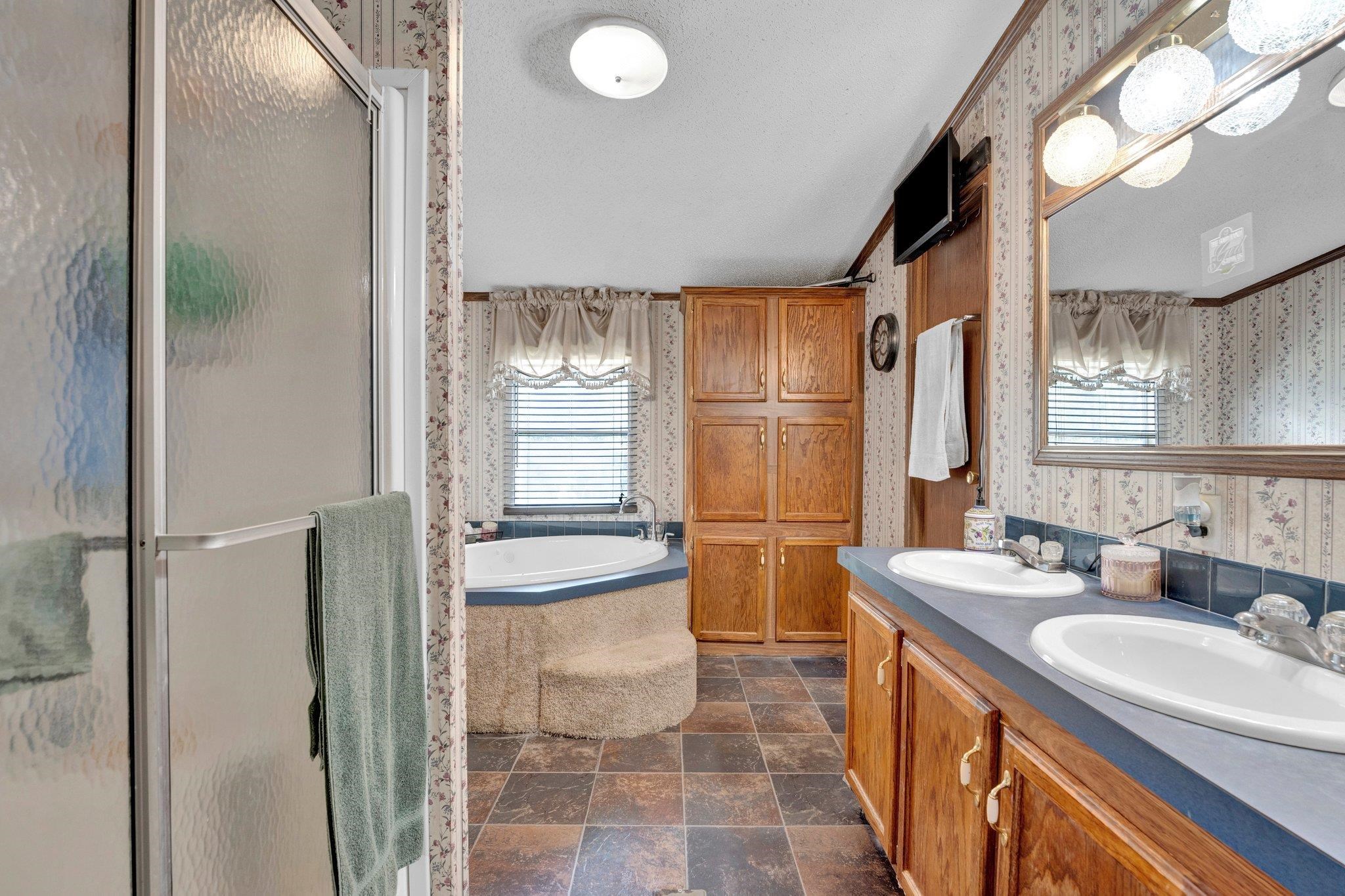 6170 Rust Road Millington, TN 38053 - Photo 25 of 34 a bathroom with a sink a toilet and a mirror