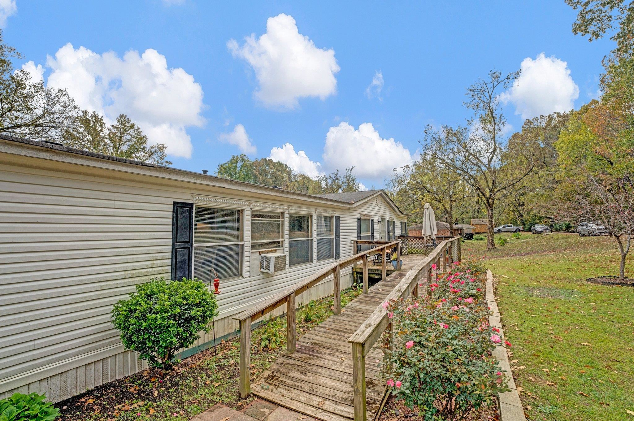 6170 Rust Road Millington, TN 38053 - Photo 4 of 34 a view of a house with backyard and sitting area