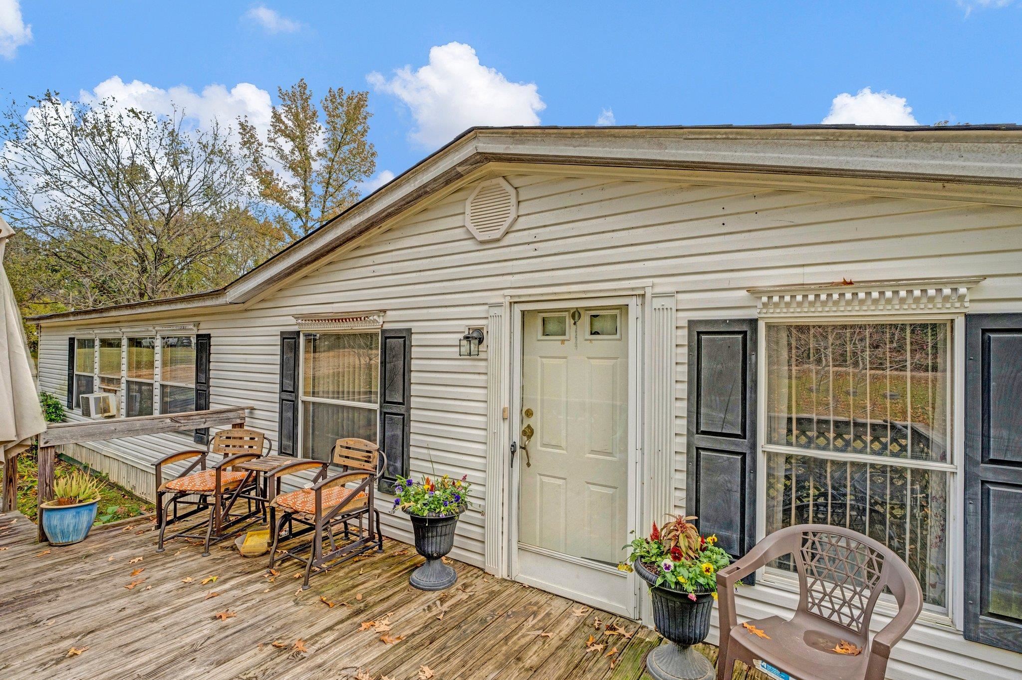 6170 Rust Road Millington, TN 38053 - Photo 5 of 34 a front view of a house with seating space
