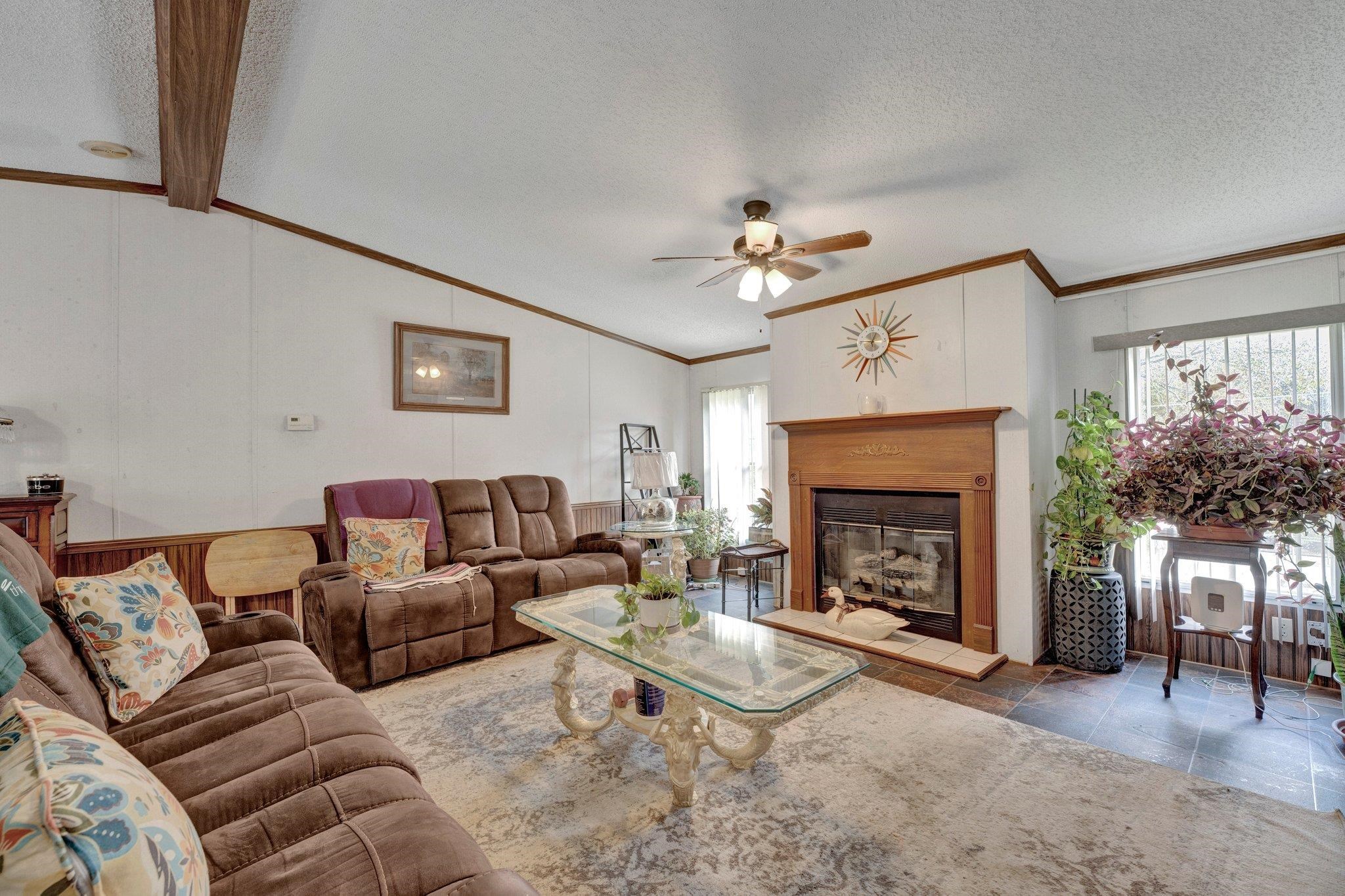 6170 Rust Road Millington, TN 38053 - Photo 9 of 34 a living room with furniture and a fireplace