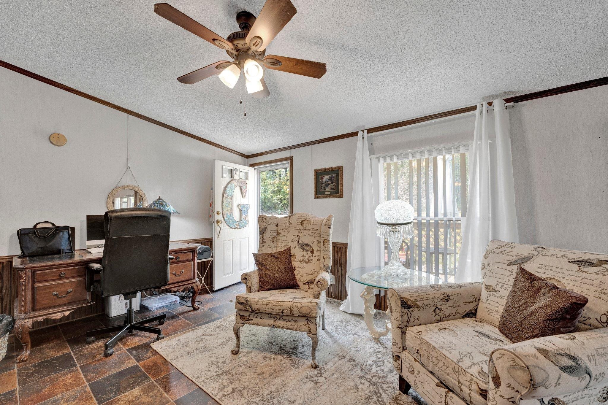 6170 Rust Road Millington, TN 38053 - Photo 10 of 34 a living room with furniture a large window and a chandelier