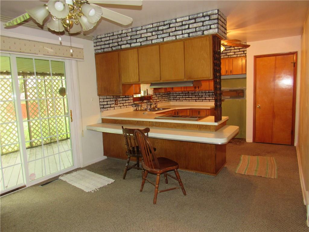 144 Pleasant Hill Road Harmony, PA 16037 - Photo 11 of 31 a room with a large window and furniture