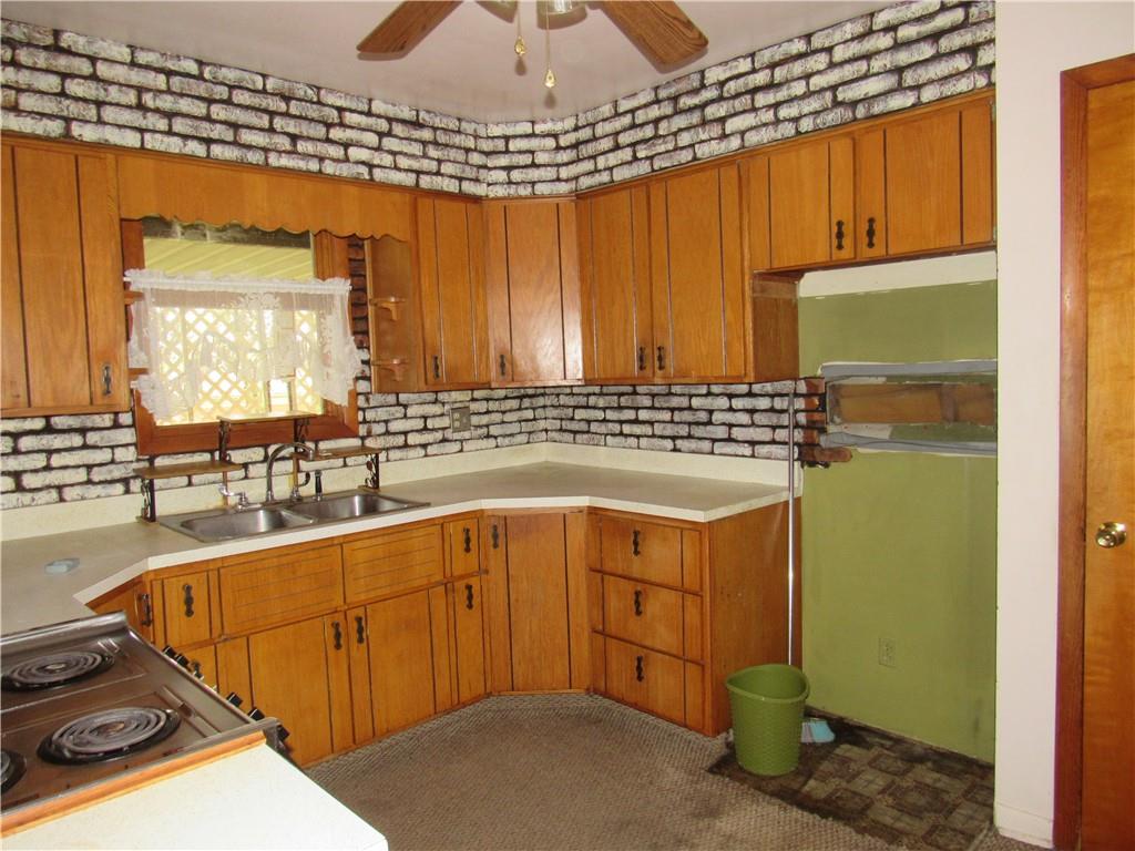 144 Pleasant Hill Road Harmony, PA 16037 - Photo 13 of 31 a view of a sink and a window