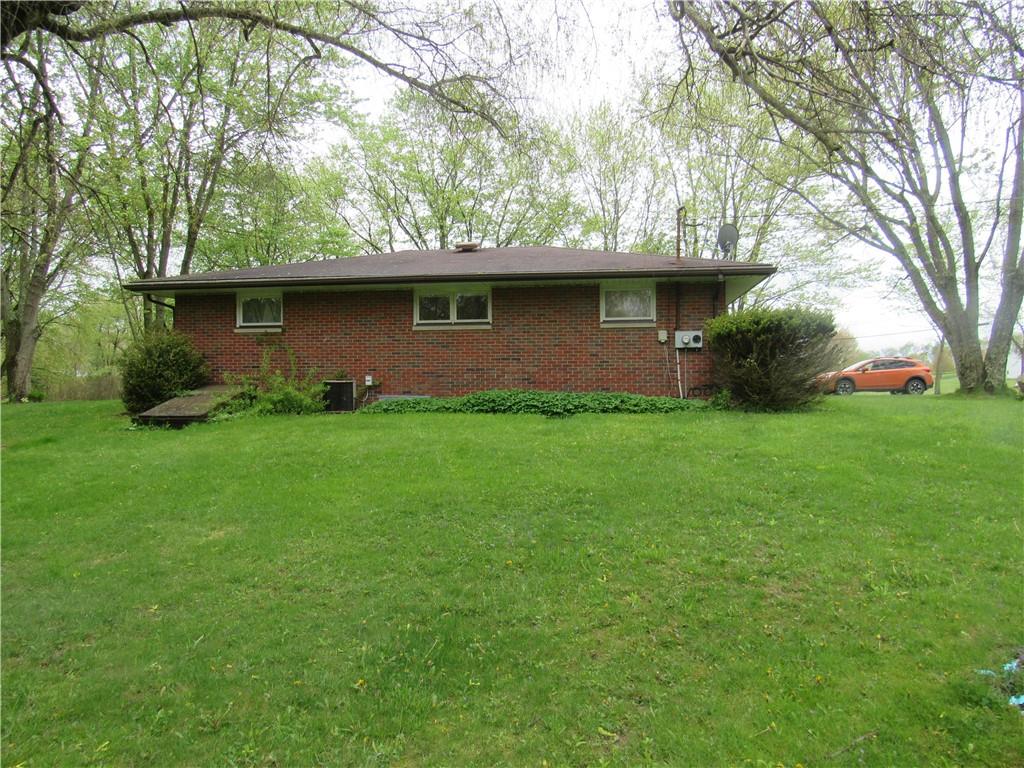 144 Pleasant Hill Road Harmony, PA 16037 - Photo 27 of 31 a view of a tree in front of a house