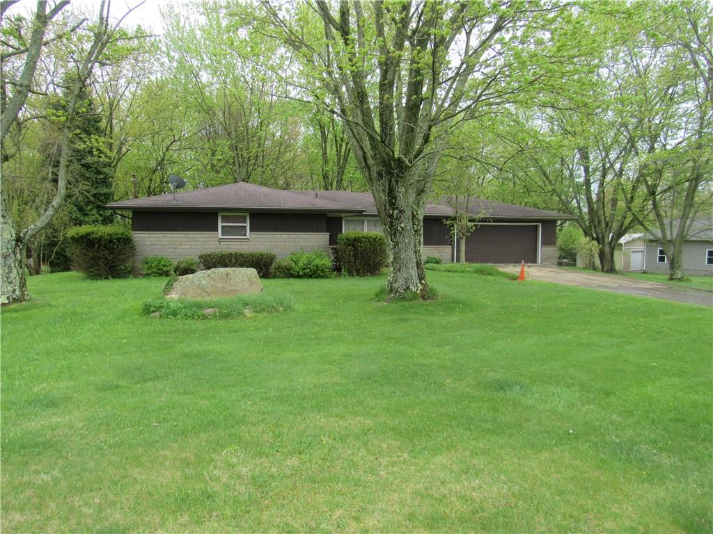144 Pleasant Hill Road Harmony, PA 16037 - Photo 3 of 31 a front view of house with yard and green space