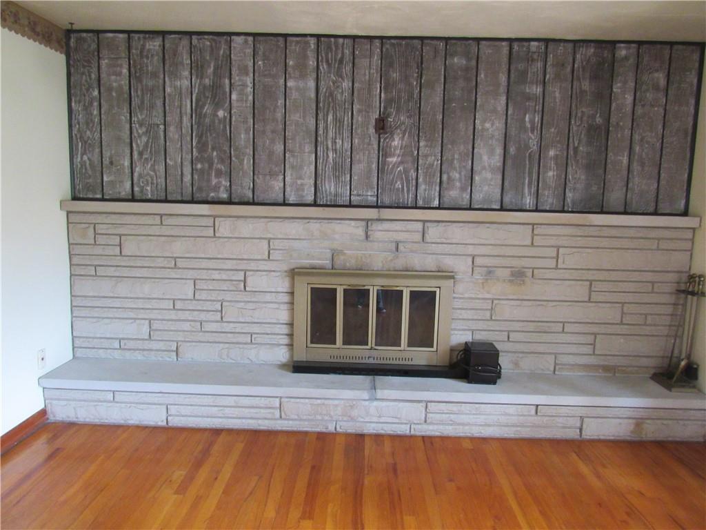 144 Pleasant Hill Road Harmony, PA 16037 - Photo 7 of 31 a view of a fireplace