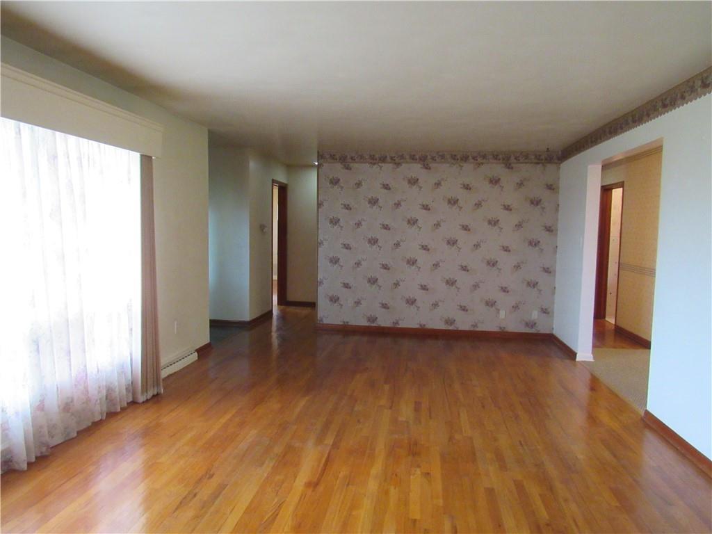 144 Pleasant Hill Road Harmony, PA 16037 - Photo 8 of 31 a view of a livingroom with wooden floor