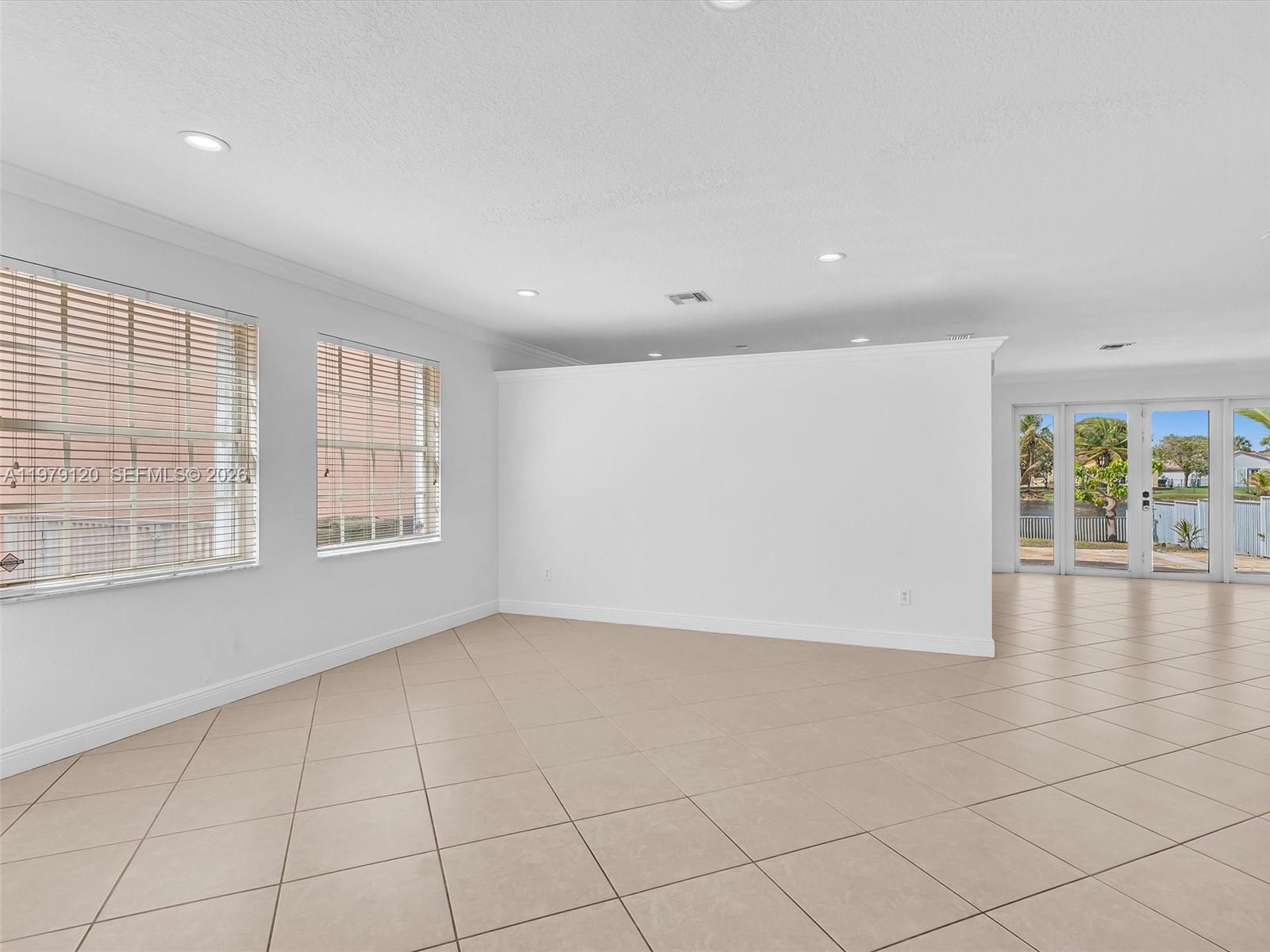 15363 Northwest 14th Road Pembroke Pines, FL 33028 - Photo 16 of 71 an empty room with windows