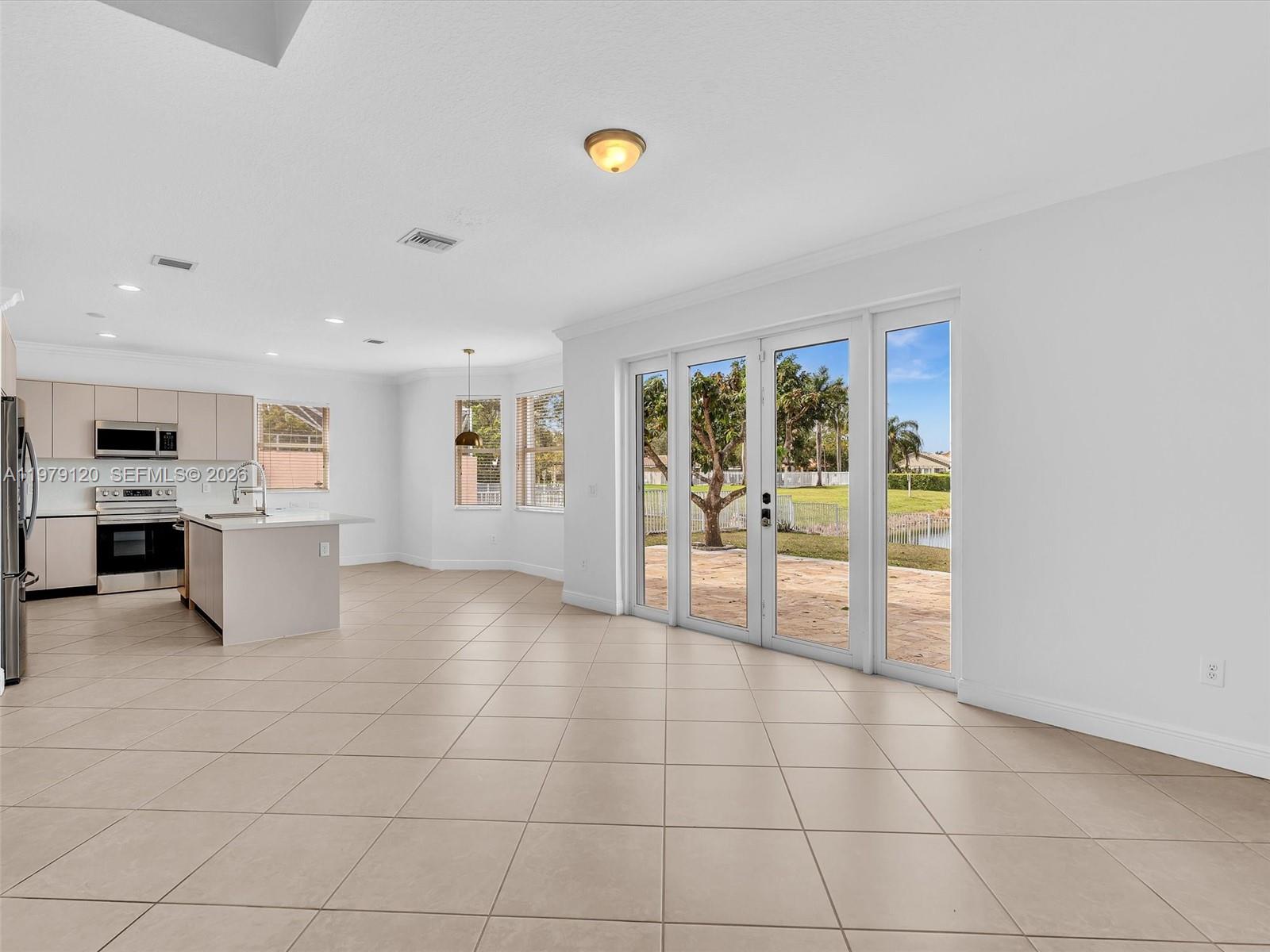15363 Northwest 14th Road Pembroke Pines, FL 33028 - Photo 18 of 71 a view of kitchen with furniture and refrigerator