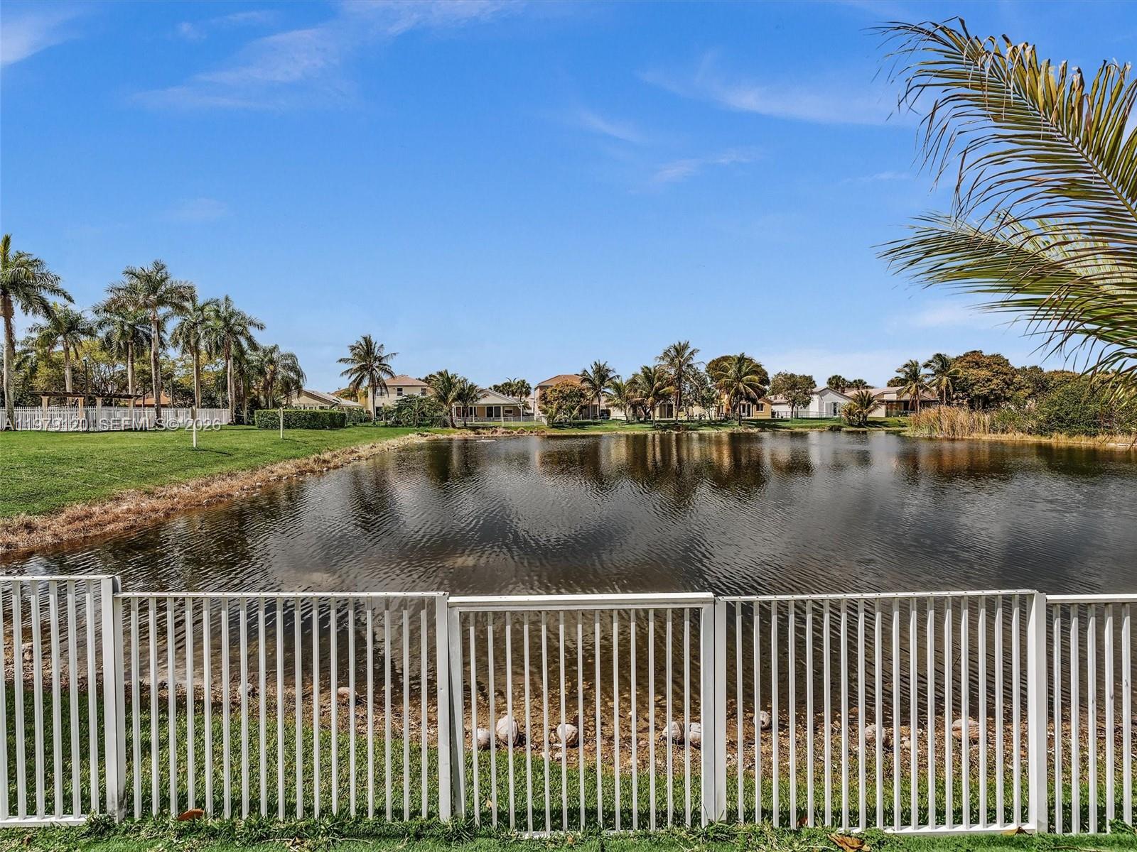 15363 Northwest 14th Road Pembroke Pines, FL 33028 - Photo 24 of 71 a view of a lake with a city