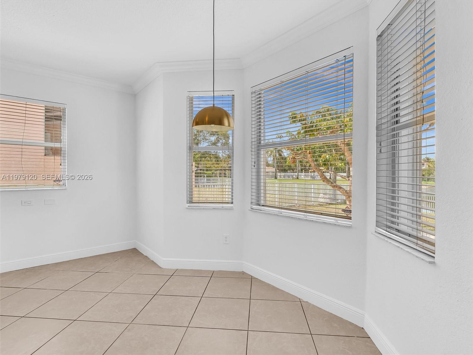15363 Northwest 14th Road Pembroke Pines, FL 33028 - Photo 31 of 71 a view of an empty room with a window