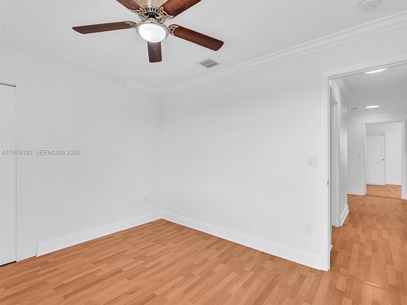 15363 Northwest 14th Road Pembroke Pines, FL 33028 - Photo 44 of 71 a view of a room with wooden floor
