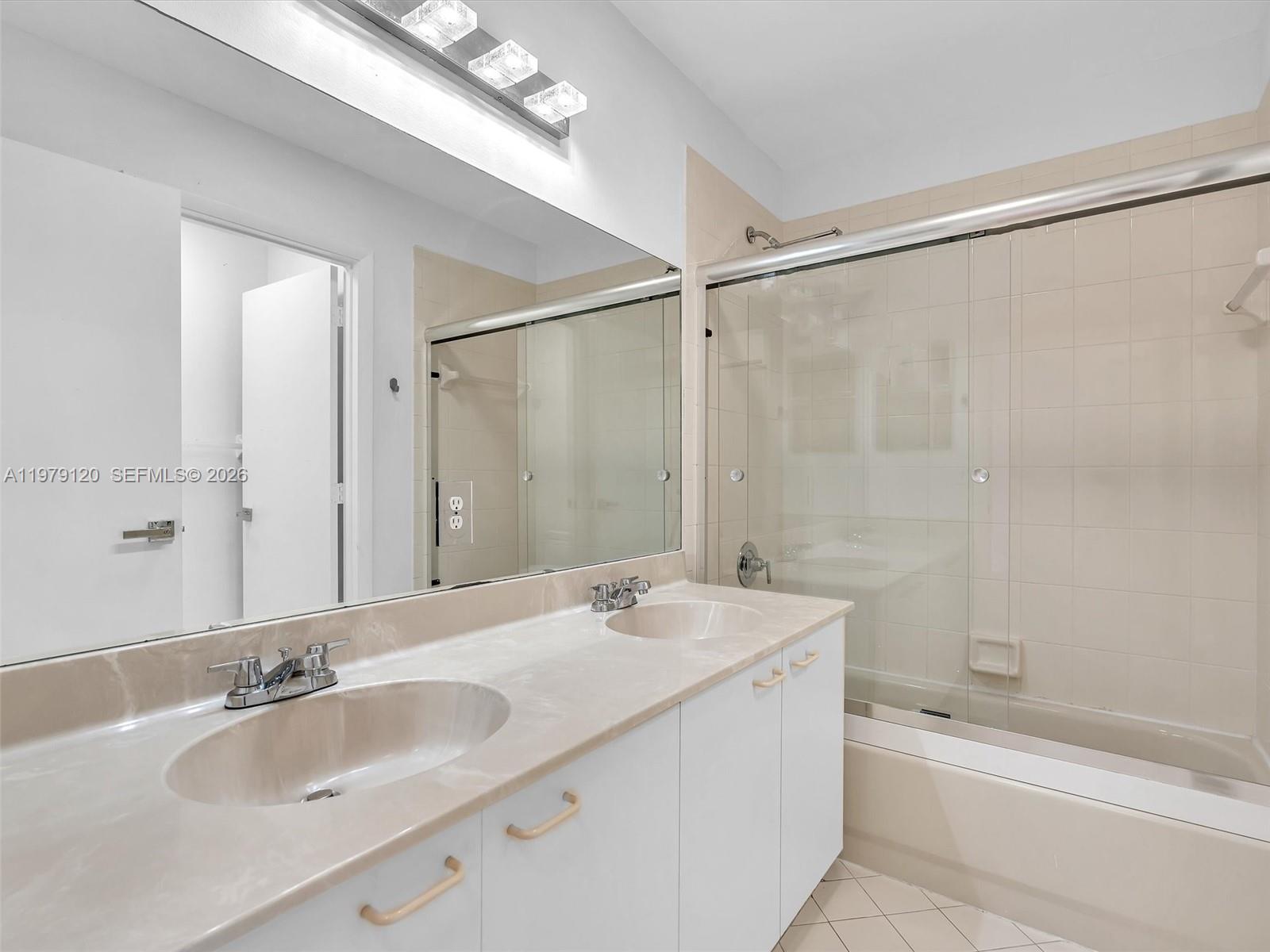 15363 Northwest 14th Road Pembroke Pines, FL 33028 - Photo 49 of 71 a bathroom with a bathtub and a sink