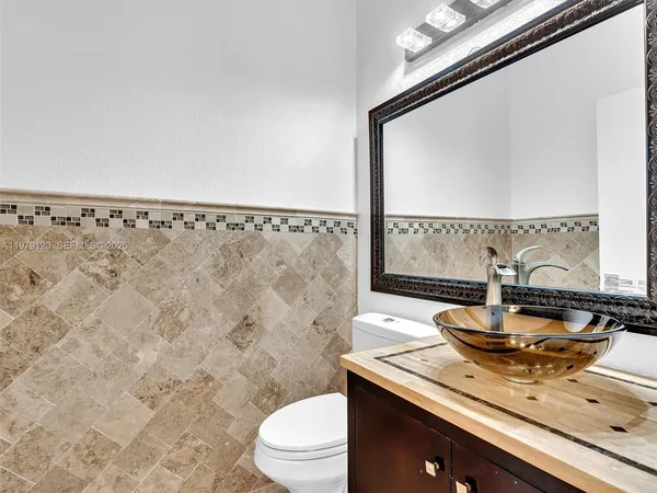 a view of a swimming pool with an outdoor seating