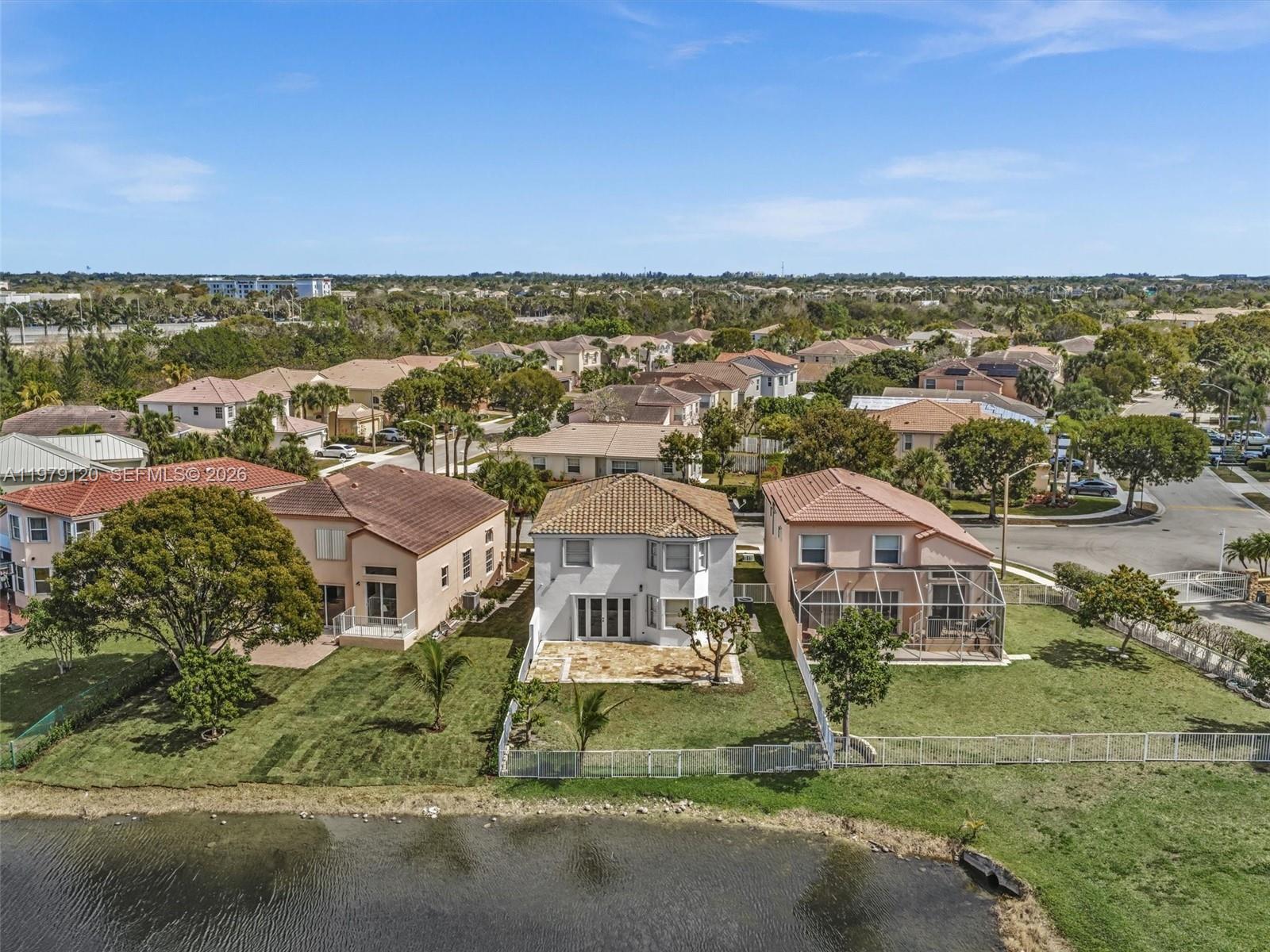 15363 Northwest 14th Road Pembroke Pines, FL 33028 - Photo 55 of 71 an aerial view of residential houses with outdoor space and trees