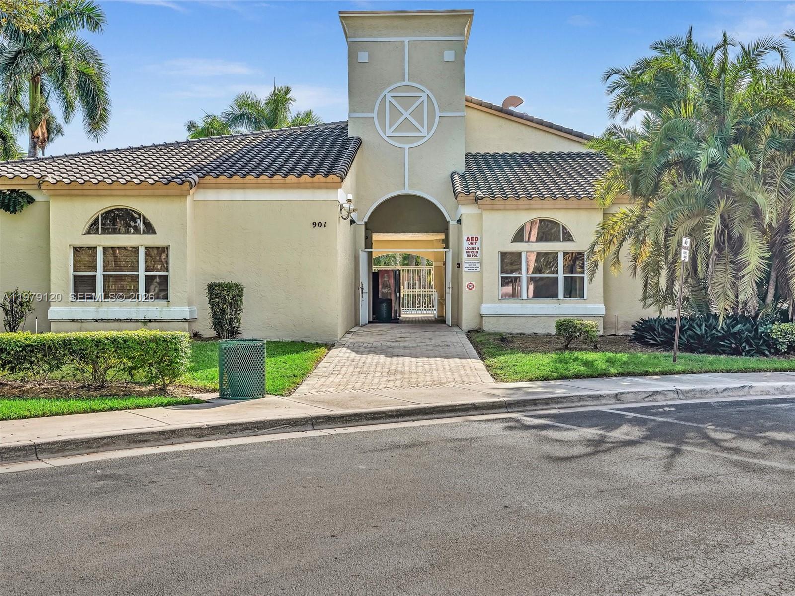 15363 Northwest 14th Road Pembroke Pines, FL 33028 - Photo 63 of 71 front view of a house with a yard