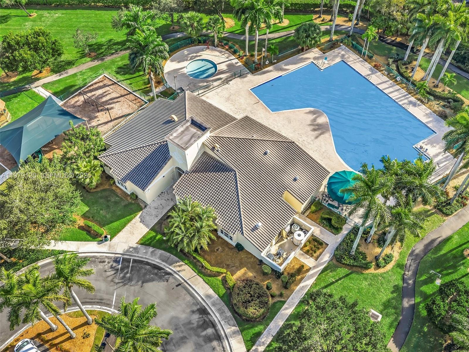 15363 Northwest 14th Road Pembroke Pines, FL 33028 - Photo 68 of 71 an aerial view of a house with a yard