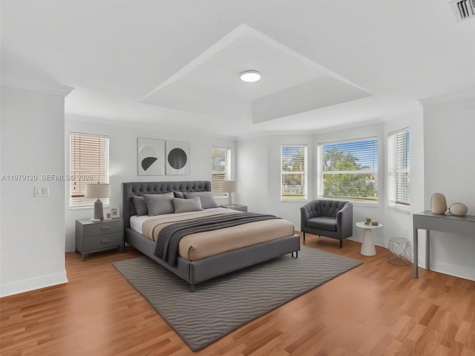 15363 Northwest 14th Road Pembroke Pines, FL 33028 - Photo 9 of 71 a bedroom with a bed and wooden floor