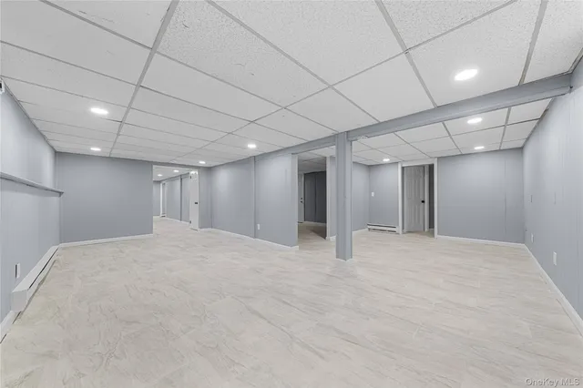 a bathroom with a toilet sink and vanity