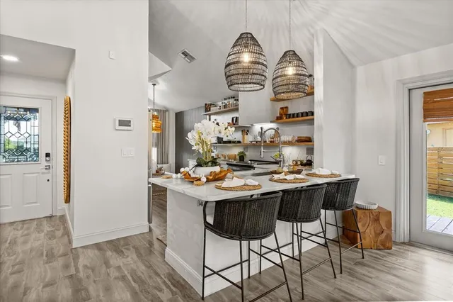 a bedroom with bed and window