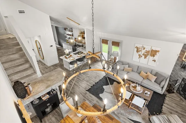 a view of a patio with a dining table and chairs