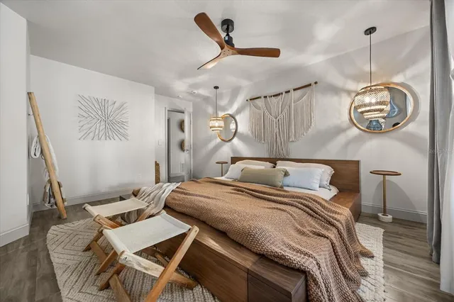 a view of a backyard with plants and a garden