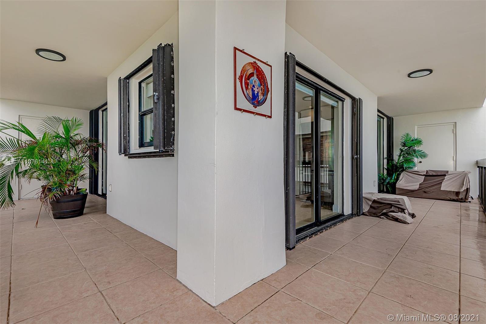 2333 Brickell Avenue, Unit 1406 Miami, FL 33129 - Photo 21 of 38 a view of an entryway with wooden floor