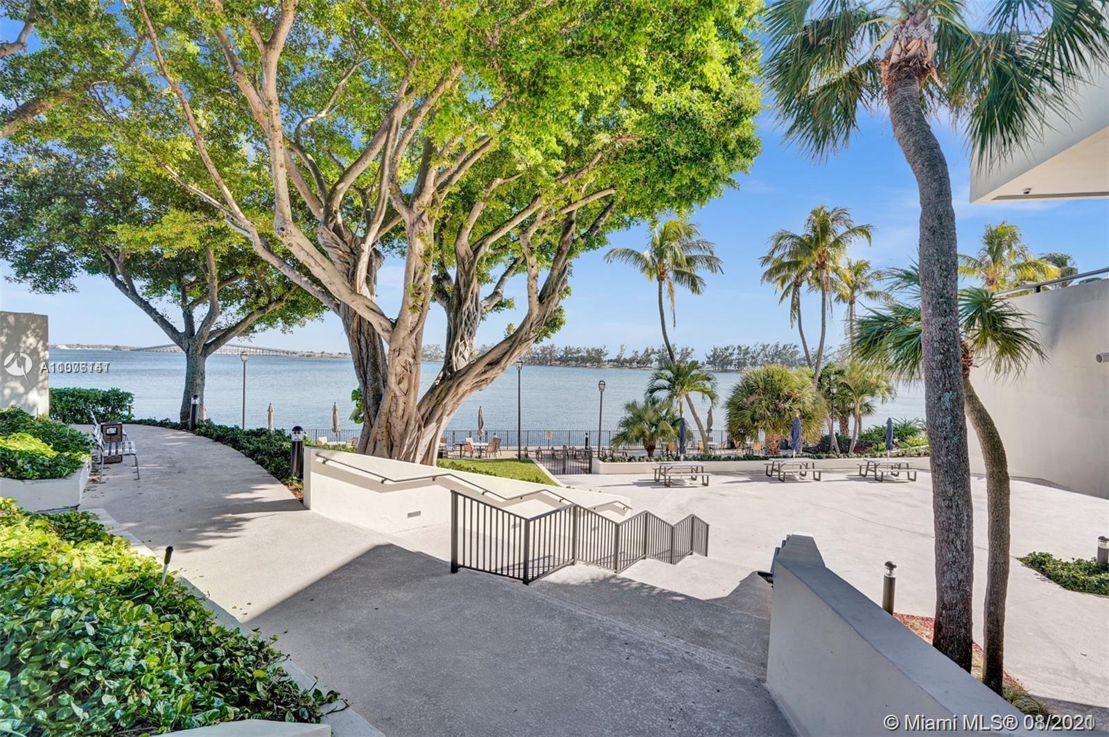 2333 Brickell Avenue, Unit 1406 Miami, FL 33129 - Photo 32 of 38 a view of a terrace with a tree