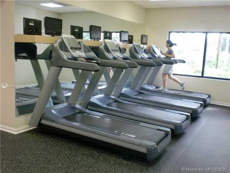 2333 Brickell Avenue, Unit 1406 Miami, FL 33129 - Photo 33 of 38 a living room with furniture