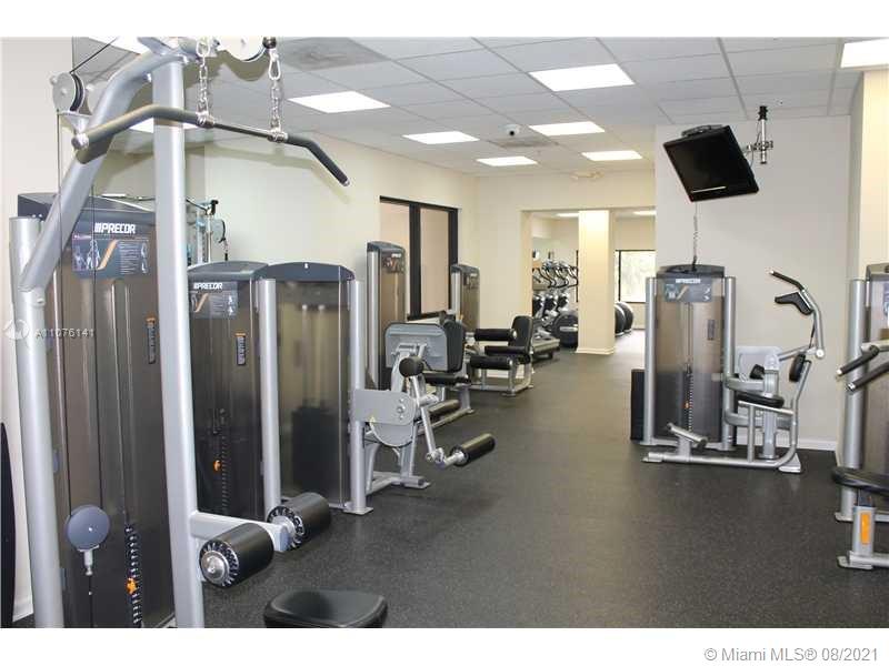2333 Brickell Avenue, Unit 1406 Miami, FL 33129 - Photo 35 of 38 a view of a room with gym equipment