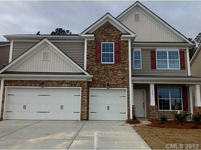 79091 Ridgehaven Road, Unit 164 Lancaster, SC 29720 - Photo 1 of 16 a front view of a house with a yard