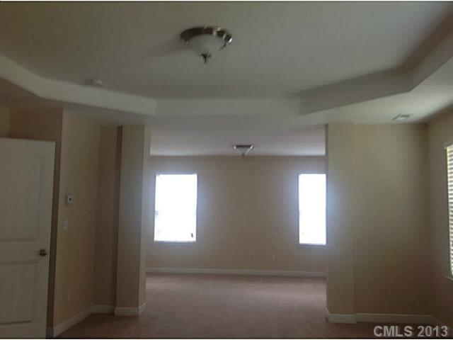 79091 Ridgehaven Road, Unit 164 Lancaster, SC 29720 - Photo 12 of 16 a view of an empty room with a window