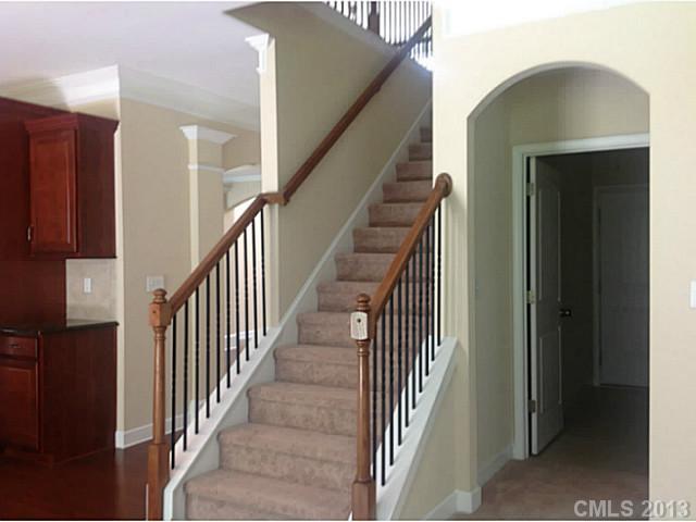 79091 Ridgehaven Road, Unit 164 Lancaster, SC 29720 - Photo 5 of 16 a view of a hallway with wooden floor and entryway