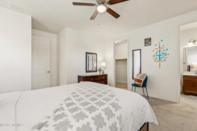 a view of a park with swings and slides