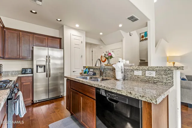 a view of a house with a street