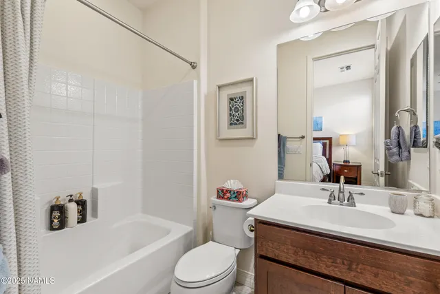 a view of a park with large trees