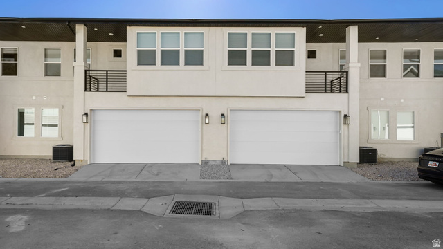 717 South Harrison Drive West Springville, UT 84663 - Photo 22 of 31 Finished outside to show the balcony when finished