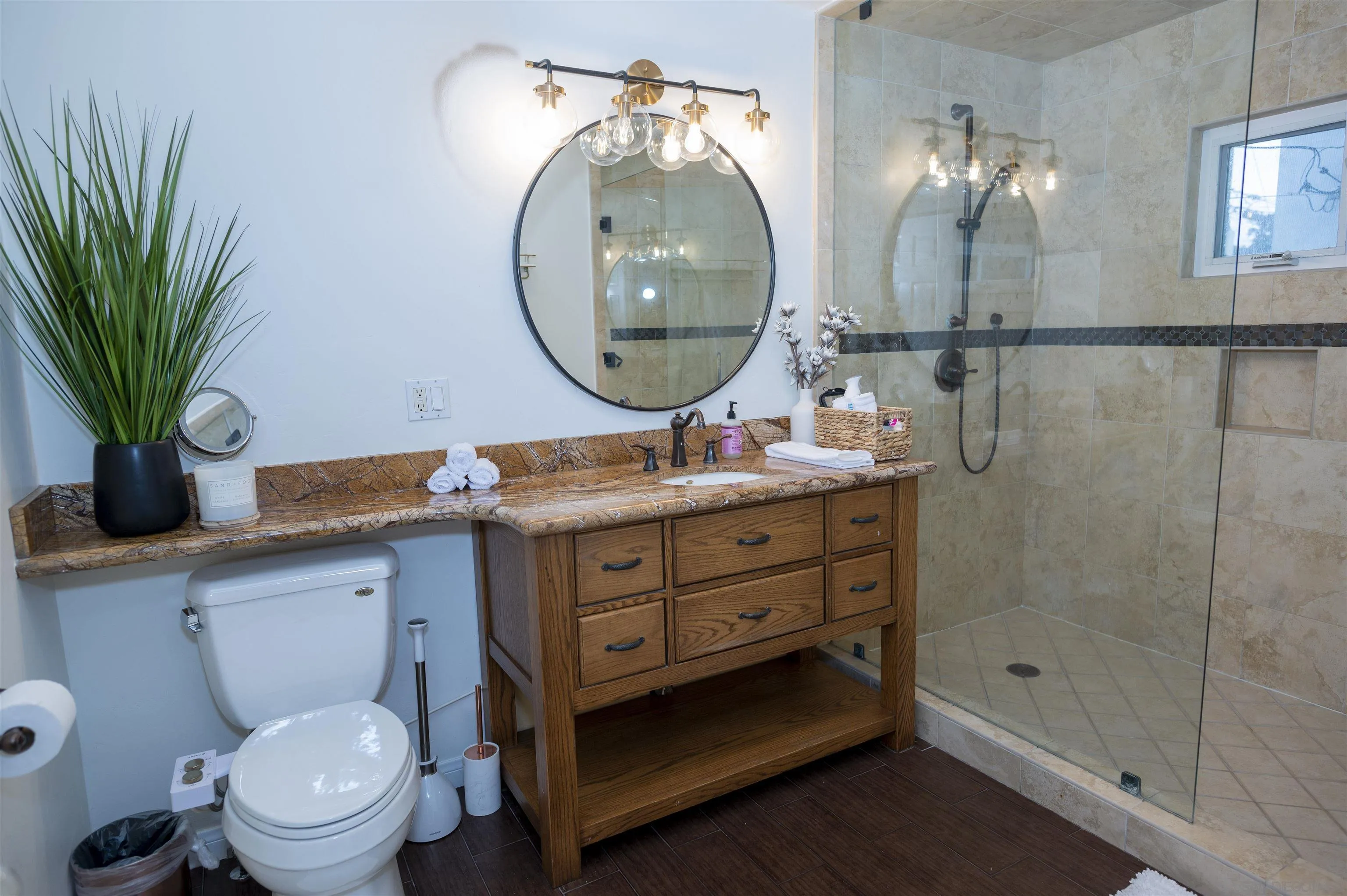 1520 Pendleton Road Coronado, CA 92118 - Photo 20 of 27 a bathroom with a toilet a sink and mirror