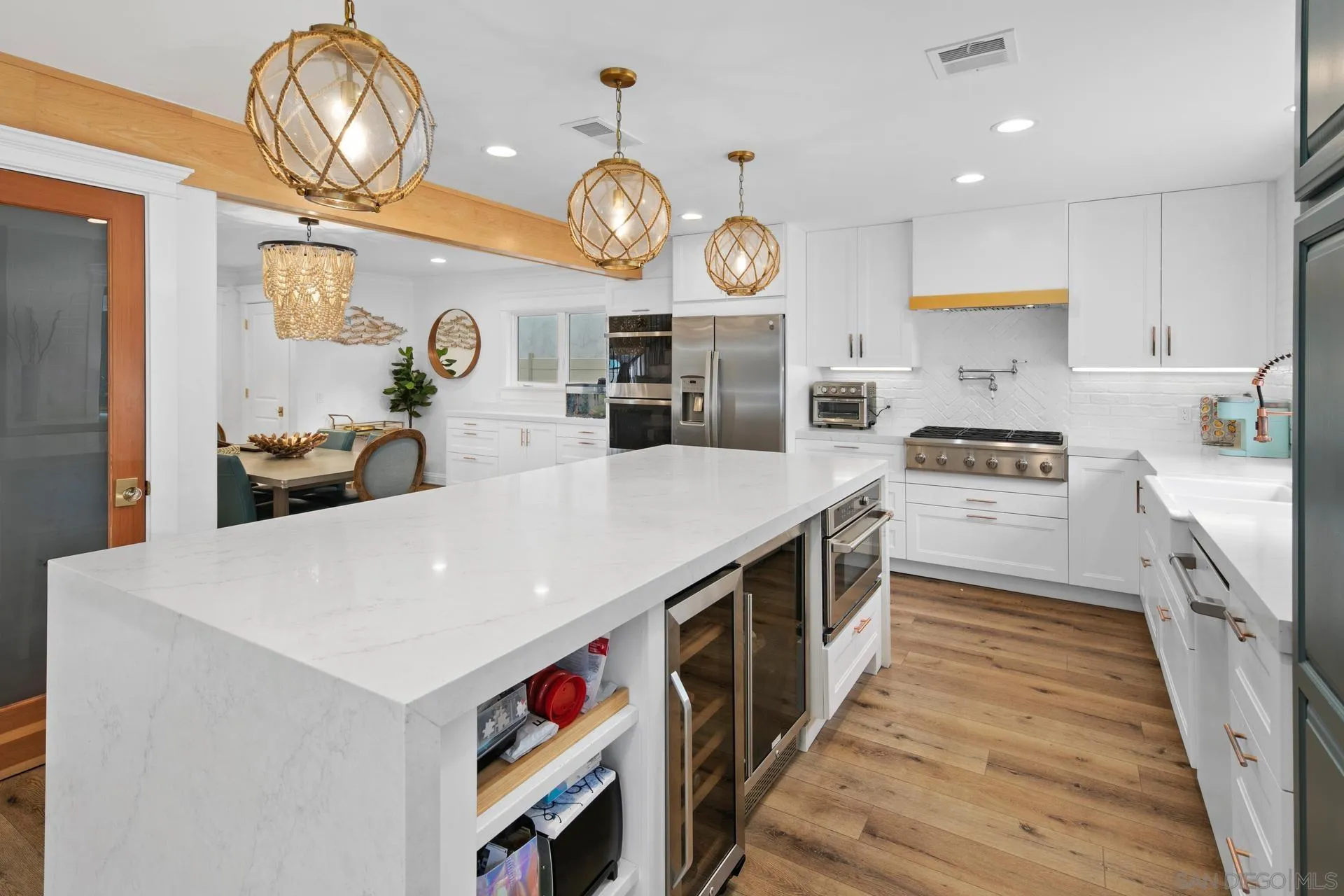 1520 Pendleton Road Coronado, CA 92118 - Photo 2 of 27 a large kitchen with a large counter space and stainless steel appliances