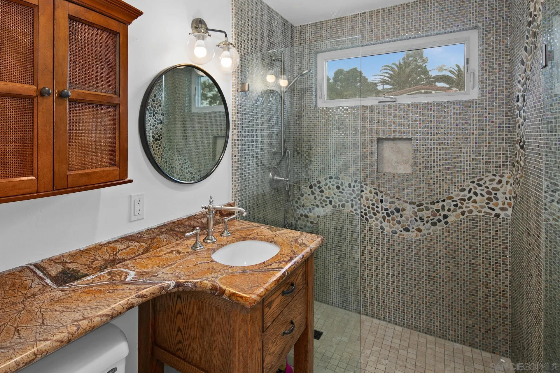 1520 Pendleton Road Coronado, CA 92118 - Photo 22 of 27 a bathroom with a sink and a mirror